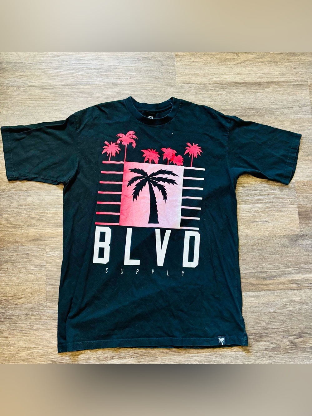 Black T‑Shirt with Pink Palm Graphic